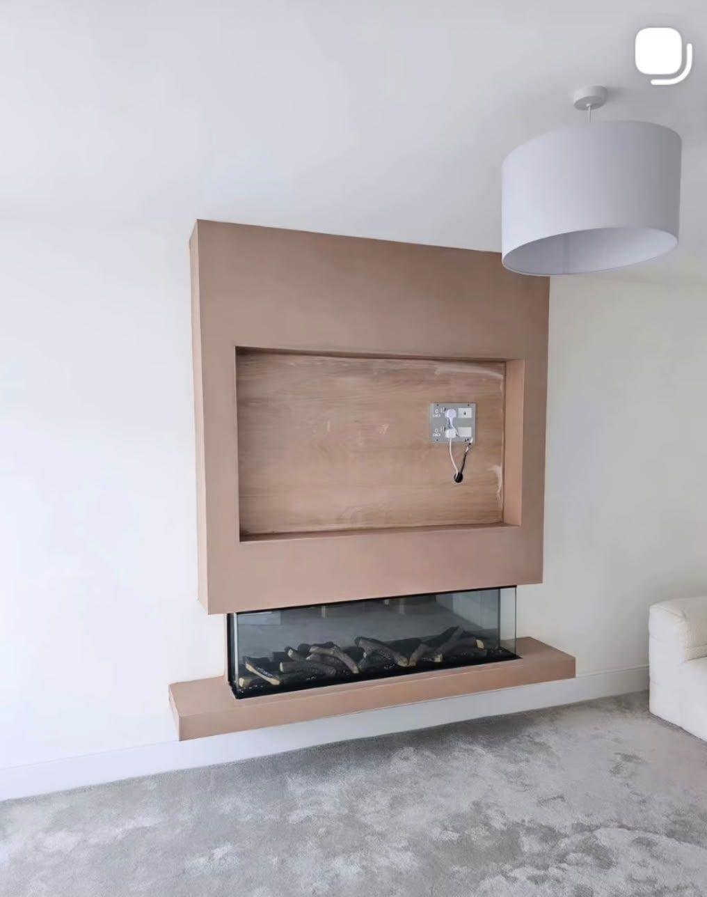 Bespoke media wall with floating fireplace and TV recess in Huddersfield